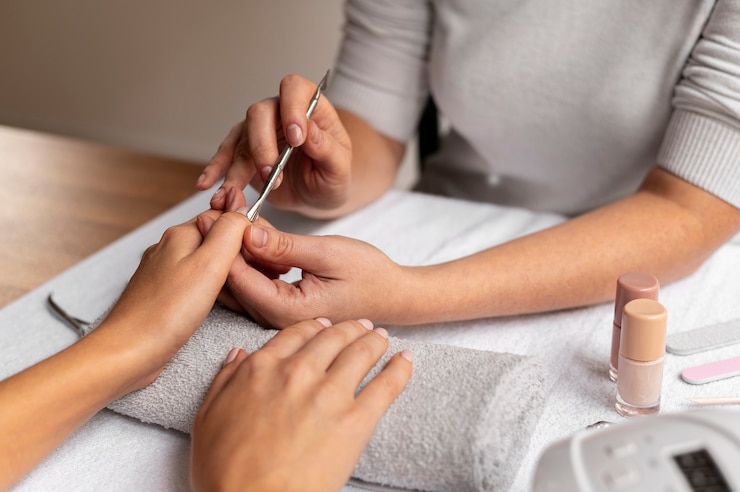 close-up-nail-care-expert-job_23-2149171326